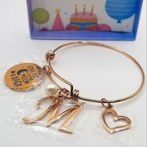 Gold toned charm bangle cuff Adustible bracelet Initial letter M.